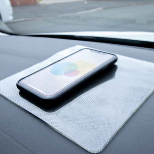 T-EG-1 Clear Extreme Mat Used as a Phone Holder in a Car-2
